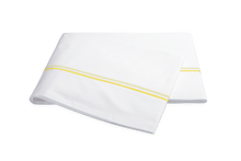 Load image into Gallery viewer, Matouk Essex flat sheet with two simple lines of embroidery in lemon yellow, one line a slightly lighter shade than the other