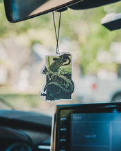 Load image into Gallery viewer, air freshener handing from a car's rear view mirror