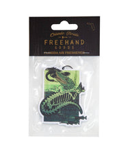 Load image into Gallery viewer, air freshener with image of gator catching a bird
