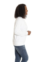 Load image into Gallery viewer, woman wearing a long sleeve white shirt