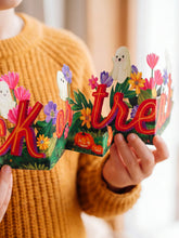 Load image into Gallery viewer, close up of hands holding a Ghostly Greetings Accordion Card
