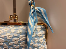Load image into Gallery viewer, Blue floral handbag with a matching scarf on a neutral background