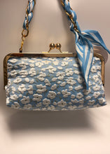 Load image into Gallery viewer, Blue floral handbag with a matching strap on a light background