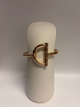 Load image into Gallery viewer, Gold ring on a white cushion against a light gray background