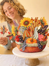 Load image into Gallery viewer, person reading a card with the FreshCut Paper Golden Harvest Greeting Card