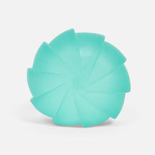 Load image into Gallery viewer, teal stress ball with edge shaped texture
