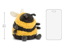 Load image into Gallery viewer, Jellycat Albee Bee showing size in comparison to a cellphone. 5.1 inches
