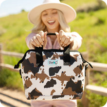 Load image into Gallery viewer, person holding a Packi 12 Cooler