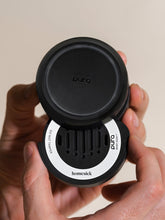 Load image into Gallery viewer, Pura Car Diffuser devise held in a persons hands