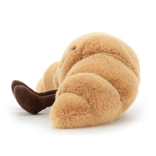 Load image into Gallery viewer, Side view of Amuseables Croissant with smiling face a feet