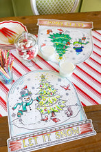 Load image into Gallery viewer, Hester & Cook Die-cut Snow Globe Coloring Placemat brightly colored on a table with sweets and milk