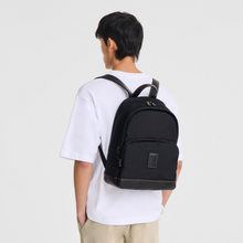 Load image into Gallery viewer, person wearing the Longchamp Boxford Backpack in Black Canvas