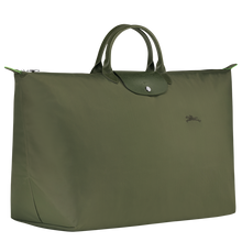 Load image into Gallery viewer, Longchamp Le Pliage Green/Recycled X-Large Canvas Travel Bag in the color Forest with green leather side view