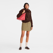 Load image into Gallery viewer, person holding a bag with the straps over her shoulder and the bag under her arm