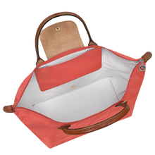 Load image into Gallery viewer, Longchamp Le Pliage Original L Top Handle Bag in pink with brown leather handles and zipper open to show white interior