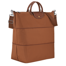 Load image into Gallery viewer, Fully expanded Longchamp Le Pliage Travel Bag Expandable in Cognac canvas and brown leather accents