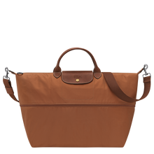 Load image into Gallery viewer, partly expanded Longchamp Le Pliage Green Travel Bag Expandable in Cognac canvas and brown leather accents
