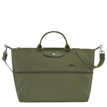 Load image into Gallery viewer, partly expanded Longchamp Le Pliage Green Travel Bag Expandable in Forest green