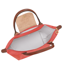 Load image into Gallery viewer, Longchamp Le Pliage Original Medium Shoulder Bag in the color strawberry showing the white interior