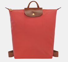 Load image into Gallery viewer, Longchamp Le Pliage Original Backpack in orange red with brown leather trimming