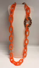 Load image into Gallery viewer, Orange chain necklace on a mannequin bust against a white background