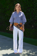 Load image into Gallery viewer, person in blue and white Striped Balloon Sleeve Shirt paired with white pants and a scarf belt