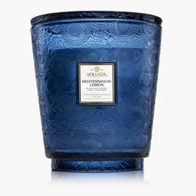 Load image into Gallery viewer, Voluspa Mediterranean Lemon 5-Wick Hearth Candle in blue glass holder