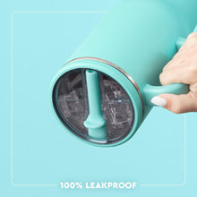 Load image into Gallery viewer, Graphic of Mega Mug 40oz close up on lid showing ice inside the mug with the mug held at a downward angle text reads 100% leakproof