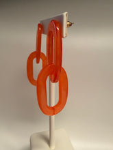 Load image into Gallery viewer, Decorative orange chain on a white background