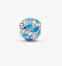 Load image into Gallery viewer, Silver charm with blue enamel leaves on a white background