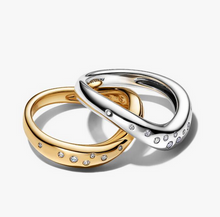 Load image into Gallery viewer, Two rings, one gold and one silver, with small diamonds on a white background