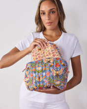 Load image into Gallery viewer, person holding a fabric bee print bag and pulling out a cream colored floral print bag from inside the large bee print bag