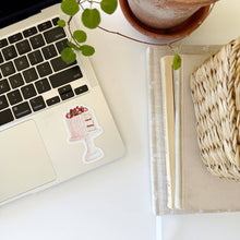 Load image into Gallery viewer, Pink Cake with strawberries sitting on a cake stand Sticker on a watercolor style on a computer