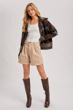 Load image into Gallery viewer, person wearing the Plaid Fuzzy Knit Sweater Jacket in shades of mocha