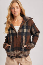 Load image into Gallery viewer, person wearing the Plaid Fuzzy Knit Sweater Jacket in shades of mocha