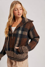 Load image into Gallery viewer, person wearing the Plaid Fuzzy Knit Sweater Jacket in shades of mocha