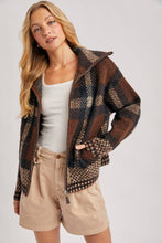 Load image into Gallery viewer, person wearing the Plaid Fuzzy Knit Sweater Jacket in shades of mocha