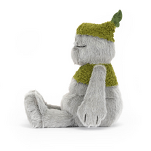 Load image into Gallery viewer, Plush toy with block 'bolder' shaped features, arms and legs with green 'moss' on its head and shoulders side view showing leaf accent on the tops of its head
