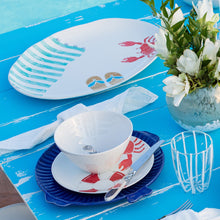 Load image into Gallery viewer, Oval platter bowl and plate with colorful painting of a crab flip flops beach towel and other beach items