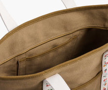 Load image into Gallery viewer, interior of the Rifle Paper Ditsy Dahlia Canvas Carry All showing pocket