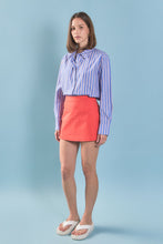 Load image into Gallery viewer, woman in Blue & Orange Stripe Cotton Shirt paired with coral short skirt