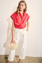 Load image into Gallery viewer, woman in the red Scallop Trim Ric Rac Short Sleeve Shirt paired with white pants