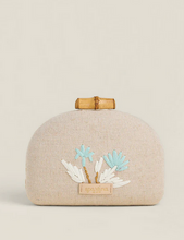 Load image into Gallery viewer, Beige clutch bag with floral design and wooden clasp on a beige background