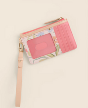 Load image into Gallery viewer, Pink cardholder with floral design on a beige background