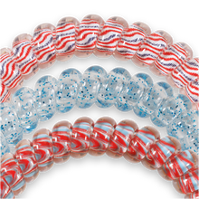 Load image into Gallery viewer, three hair ties with red white and blue patterns