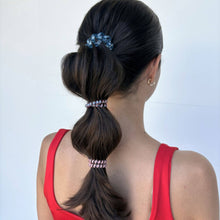 Load image into Gallery viewer, person wearing two sizes of teleties in their hair