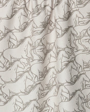 Load image into Gallery viewer, tea towel with grey and cream images of many horses running
