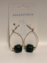 Load image into Gallery viewer, Pair of green beaded earrings on a 'Agapanthus' branded card.