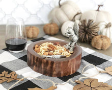 Load image into Gallery viewer, wooden bowl with silver color squirrel standing on the rim set on a fall decorated table and filled with nuts