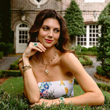 Load image into Gallery viewer, woman wearing large gold and jade jewelry